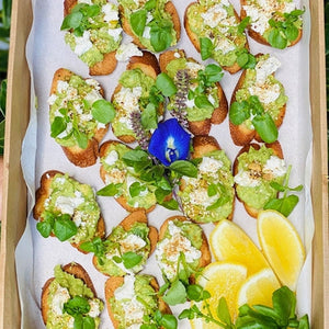 Avocado smash mini toasts with Meredith goats cheese & dukkah (box of 20) - Rosalie Gourmet Market