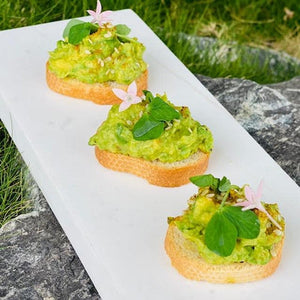 Avocado smash mini toasts with dukkah & snow pea sprouts (box of 20) (V, DF, Vegan) - Rosalie Gourmet Market